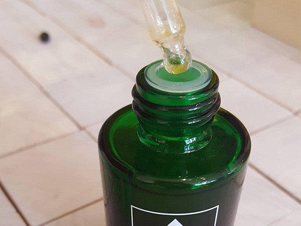 Ny wiper til droppere for å hindre søl på flaskene.